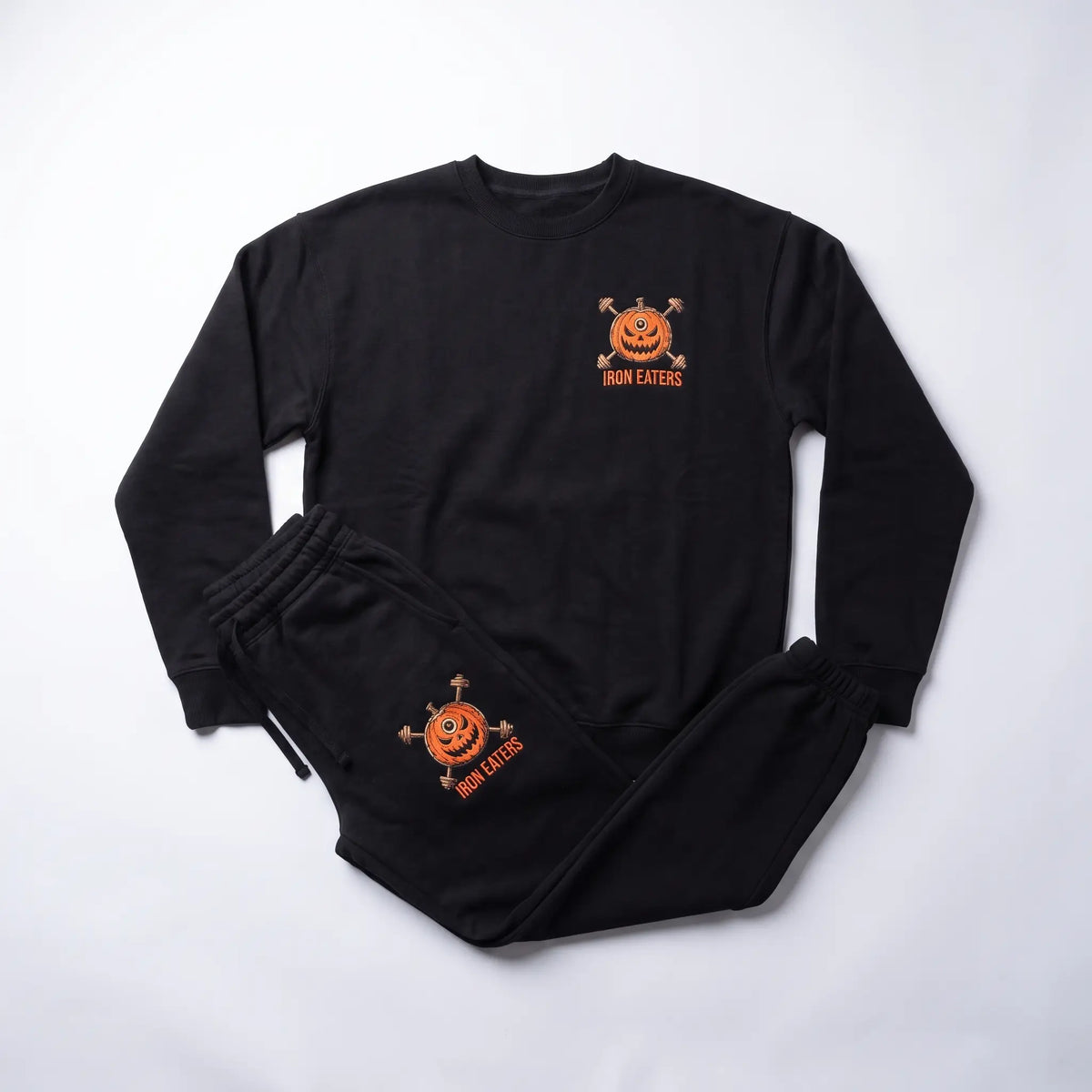 Night of the Iron Eaters crewneck and joggers flat lay